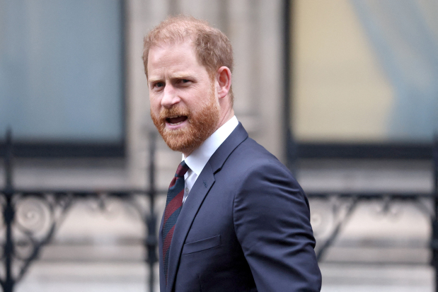 Prince Harry says media made his wife’s life ‘absolute misery’